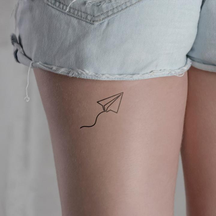 Immagine prodotto minink Tatuaggio temporaneo - aeroplano di carta con fiocco