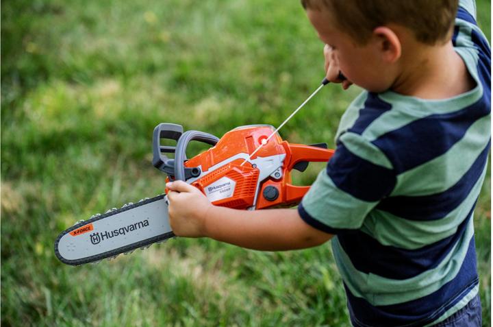 Actual product image Husqvarna Toy chainsaw 550XP