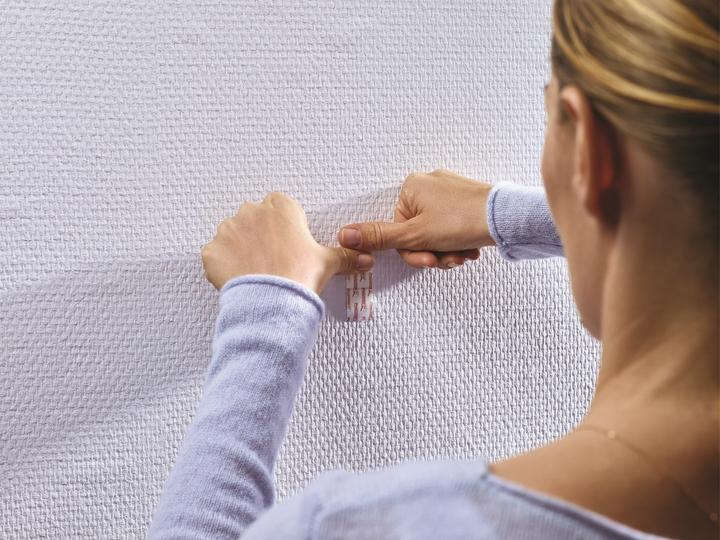 Actual product image tesa Adhesive nail wallpaper & plaster height adjustable