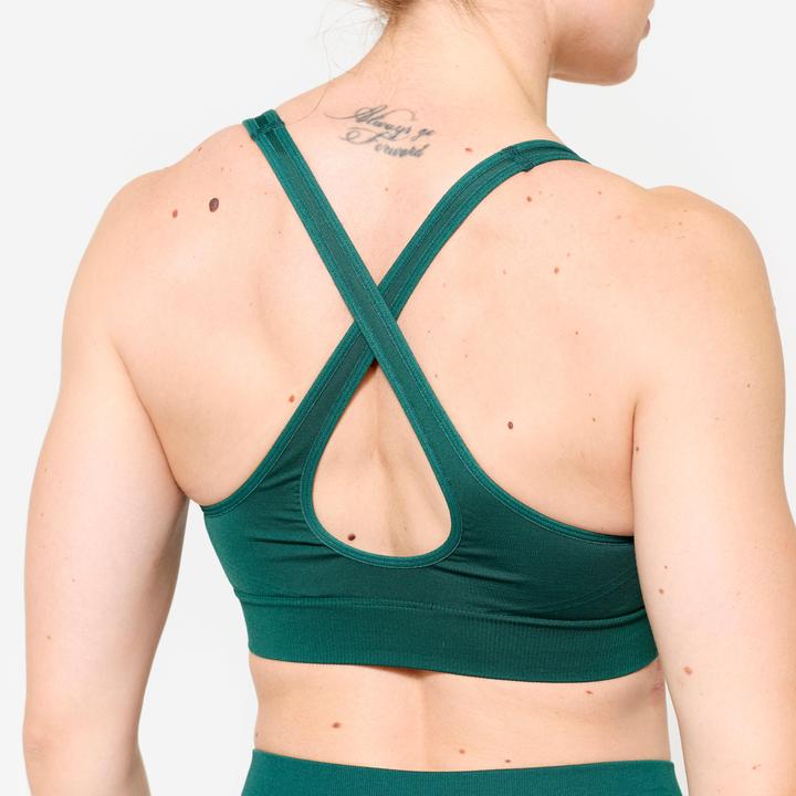 Produktbild Decathlon Sport-Bustier Damen gekreuzte Träger leichter Halt - türkis (S)