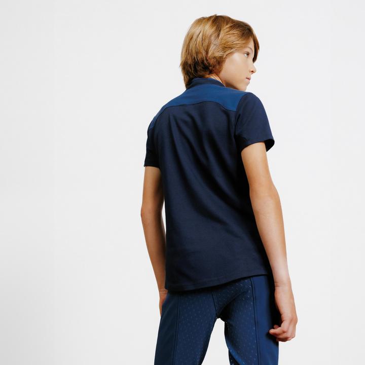 Immagine prodotto Fouganza Polo da equitazione per bambini con zip e manica corta - 500 blu scuro (122)