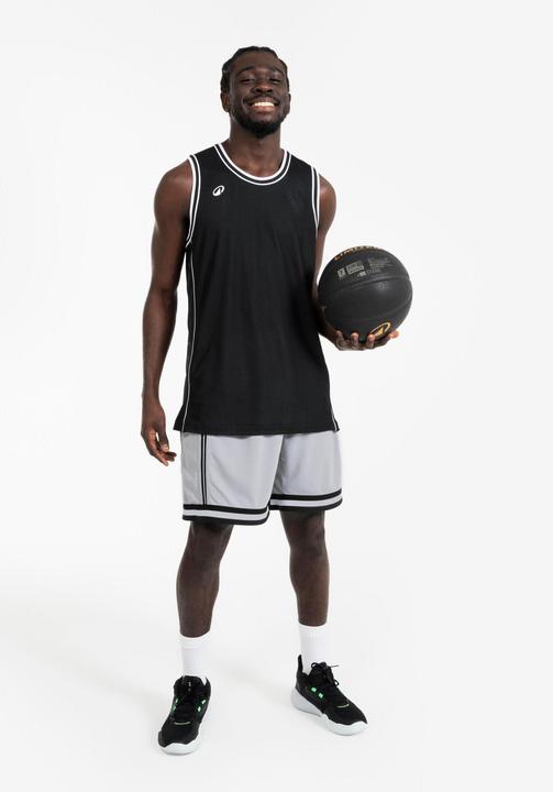 Immagine prodotto Kipsta Damen/Herren Basketball Trikot wendbar leicht - SHR 500 schwarz-weiss (XS)