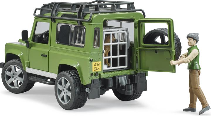 Image du produit Bruder Land Rover Defender Station Wagon avec garde forestier et chien