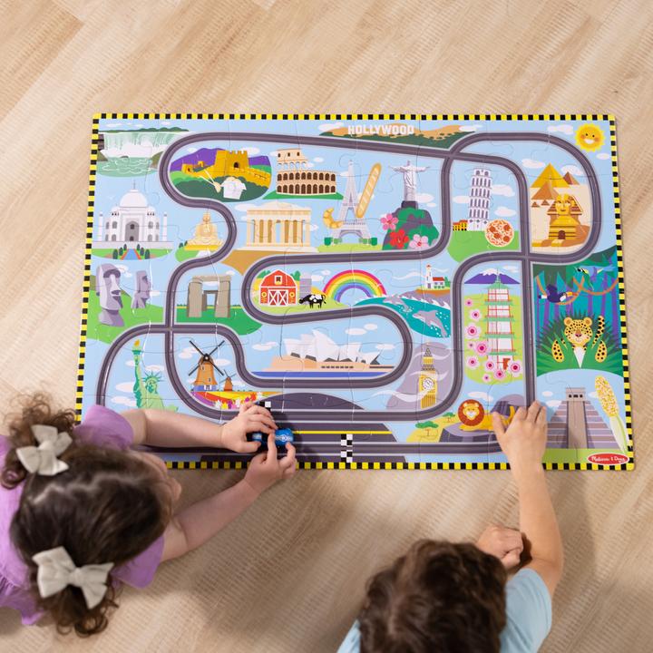Immagine prodotto Melissa & Doug Puzzle da pavimento Race Around the World Tracks (31009) (48 pezzi)
