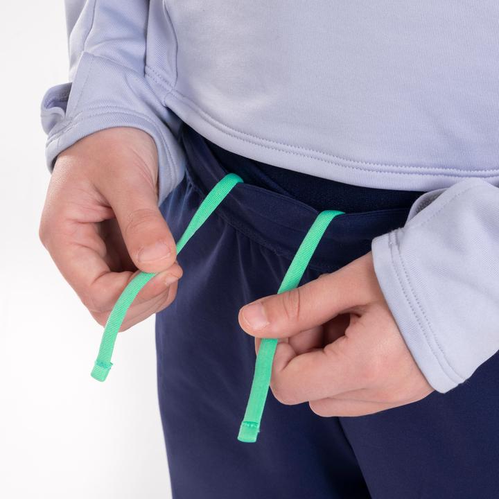 Immagine prodotto Kiprun Pantaloni da corsa caldi da bambino con zip - Warm 900 blu scuro/verde (122)