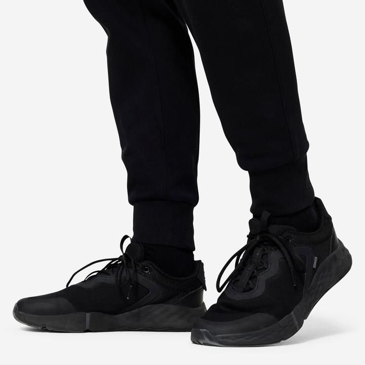 Immagine prodotto Domyos Jogginghose Herren Fleece schwarz (W32)