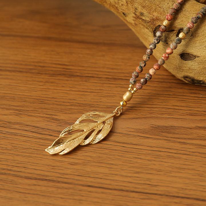 Actual product image Andreani Necklace with feather pendant made from genuine leopard jasper
