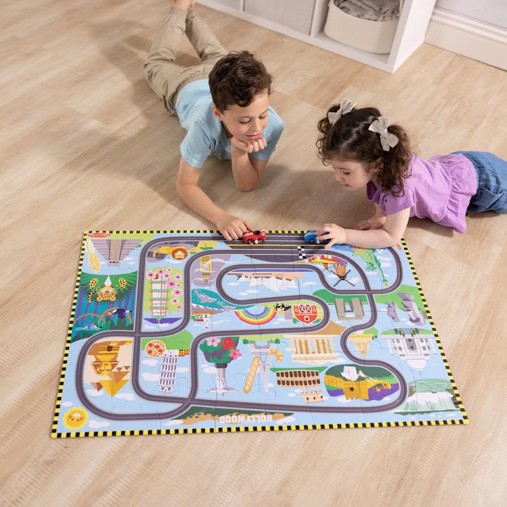 Immagine prodotto Melissa & Doug Puzzle da pavimento Race Around the World Tracks (31009) (48 pezzi)