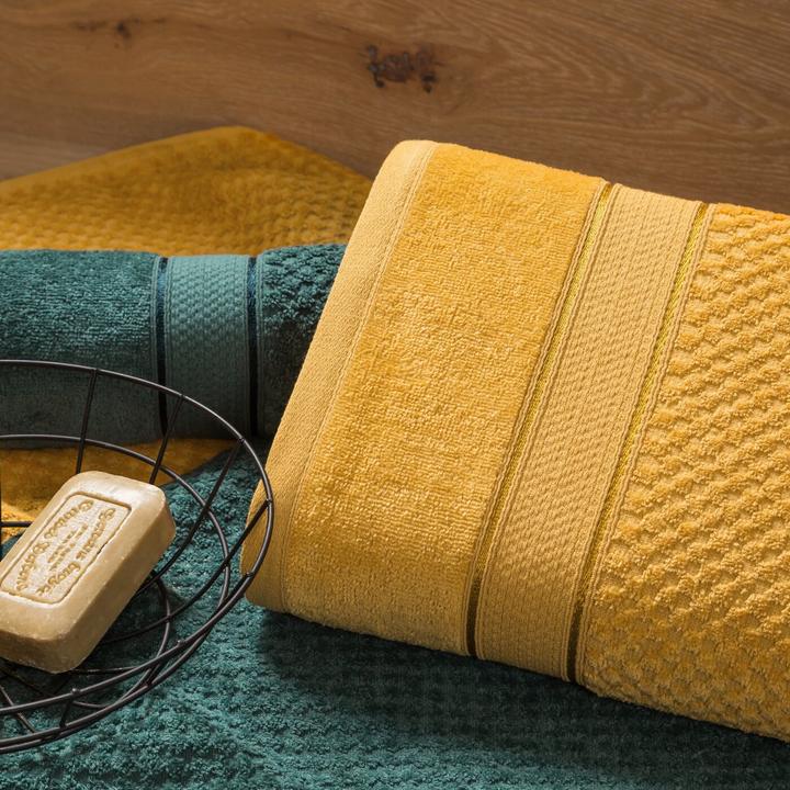 Produktbild Eurofirany EVA MINGE Fertigvorhang AURELIA aus Chiffonstoff, verziert mit Pompons mit Zusatz von glänzendem Fad (50 x 90 cm)