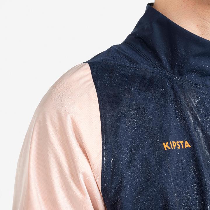 Produktbild Kipsta Damen/Herren Fussball Regenjacke - CLR marineblau/orange (L)