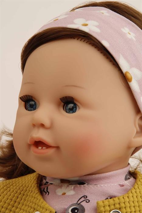 Actual product image Schildkröt Puppe Susi 45 cm braune Haare, blaue Schlafaugen, Kleidung Marienkäfer