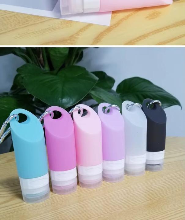 Immagine prodotto Swissdetector kit di bottiglie da viaggio portatili in silicone - impermeabile - 58 ml (Prodotto per l'igiene)