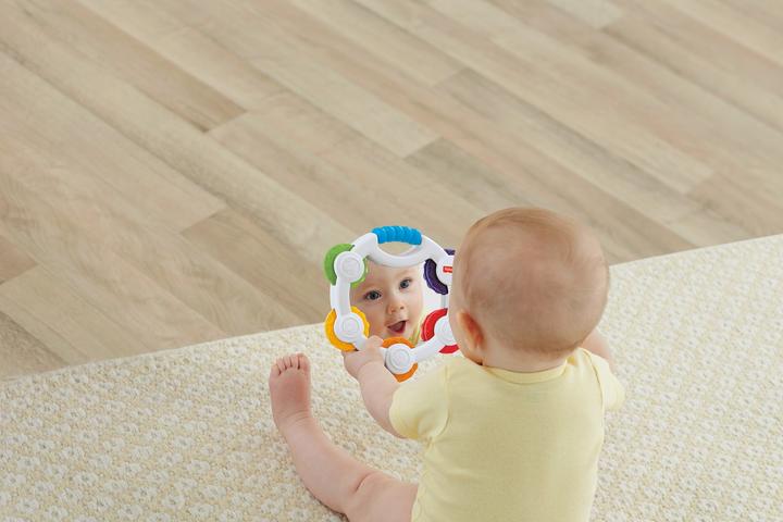 Actual product image Fisher-Price Shake 'n Beats Tambourine (French, Italian, English, Spanish, Finnish, Dutch, Greek, German)