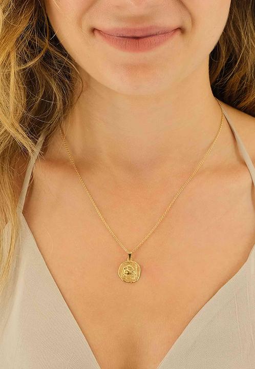 Actual product image Muau Capricorn (750/18K yellow gold)