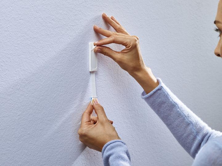 Actual product image tesa adhesive nail for wallpaper and plaster, 0,5 kg