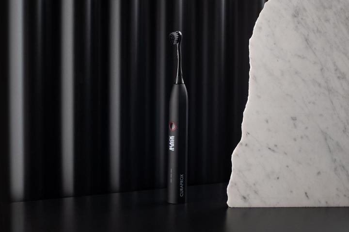 Produktbild Curaprox Hydrosonic Black is White (Schallzahnbürste)