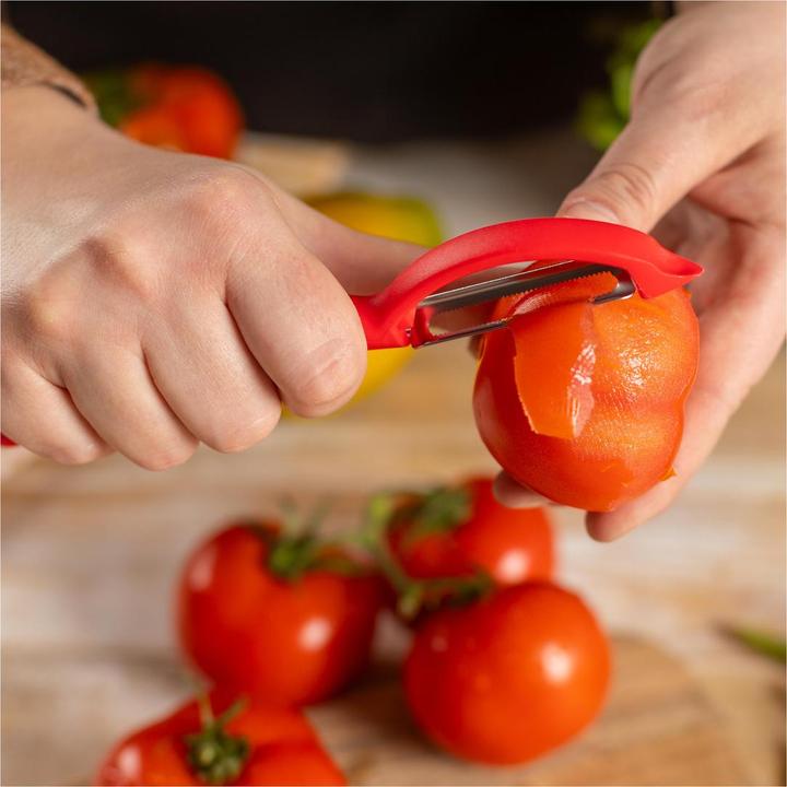 Actual product image Kuhn Rikon Peeler piranha swivel serrated red