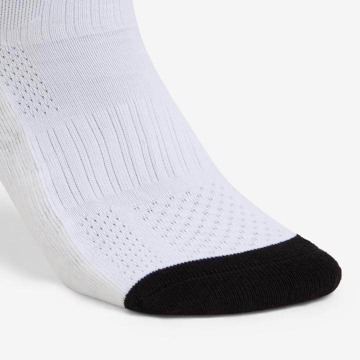 Actual product image Kipsta Damen/Herren Handball Socken Mid - H500 1 Paar weiss/schwarz (31, 34)