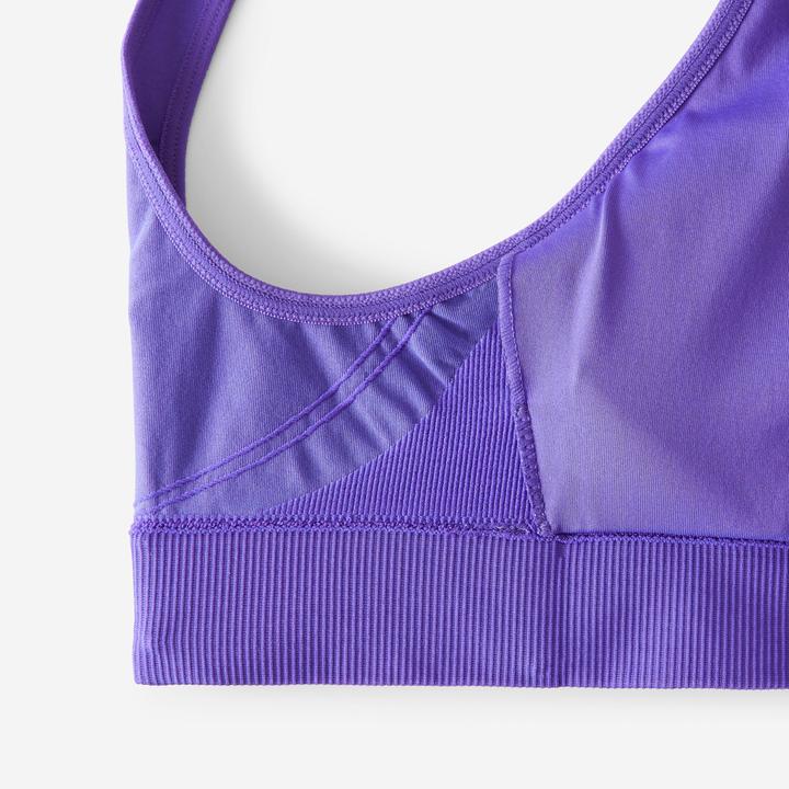 Actual product image Decathlon Women's sports bustier with crossed straps for light support - purple (XL)