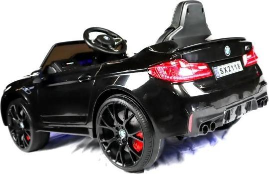 Immagine prodotto Es-toys Auto elettrica per bambini "BMW M5" - con licenza - batteria 24V, MP3, sedile in pelle + EVA - nero (24 V)