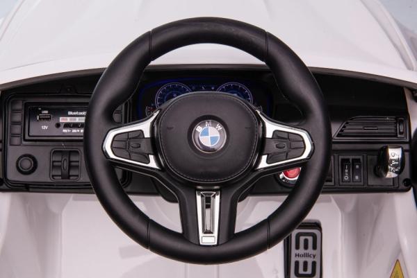 Produktbild Es-toys Elektro Kinderfahrzeug weiss "BMW M5" - Lizenziert - 12V7A Akku, 2 Motoren- 2,4Ghz Fernsteuerung, MP (12 V)