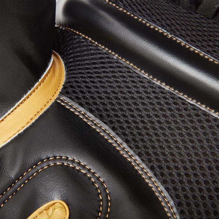 Immagine prodotto Reebok Guantoni da boxe Pro Nero/Oro (12 OZ, 12)