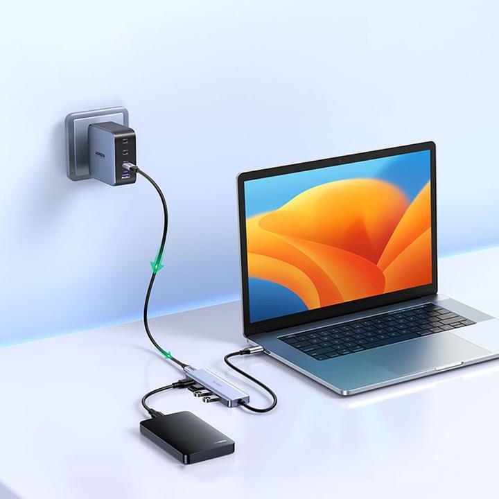 Produktbild Ugreen HUB CM219 35574 with 4 USB-A 3.0 ports and USB-A 3.0 cable 1m - black (USB-A, 4 Ports)