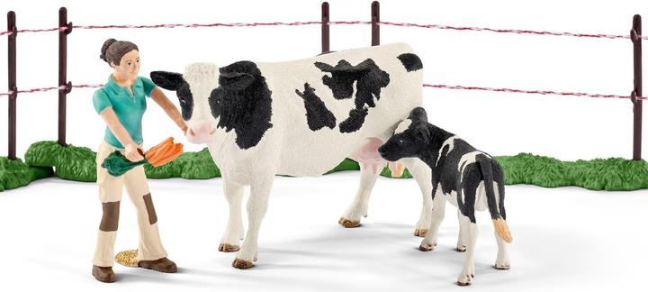 Schleich Famiglia di mucche al pascolo
