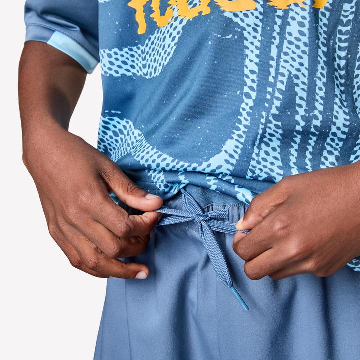 Produktbild Kipsta Kinder Fussball Shorts - VIRALTO Kids grau mit orangem Streifen (122)