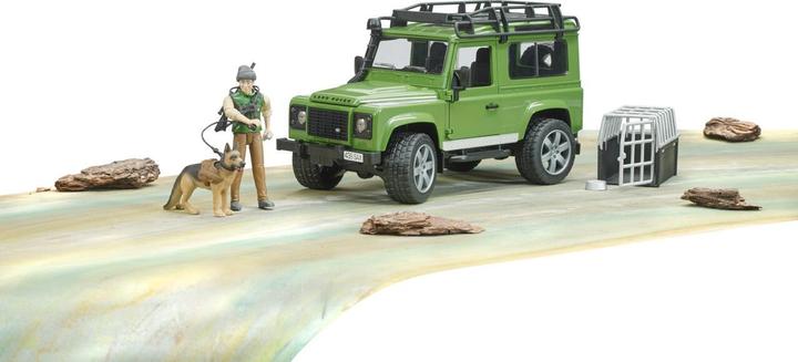 Image du produit Bruder Land Rover Defender Station Wagon avec garde forestier et chien