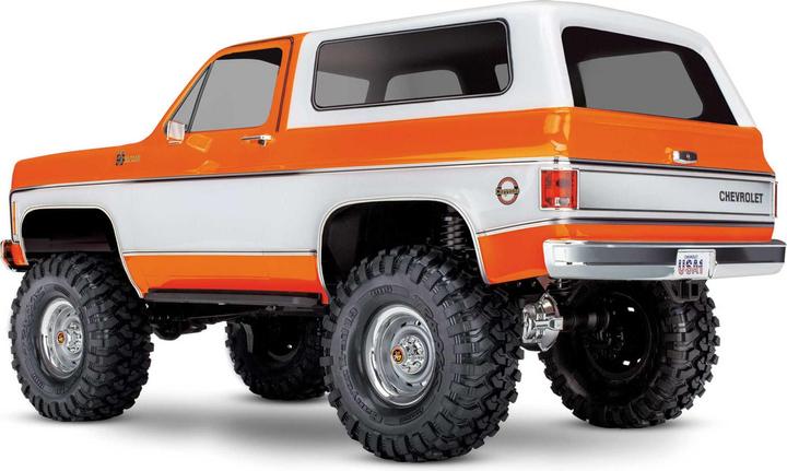Immagine prodotto Traxxas TRX-4 79 Chevy Blazer arancione/bianco 1/10 Crawler RTR spazzolato, Clipless, senza batteria e (RTR pronto all'uso)