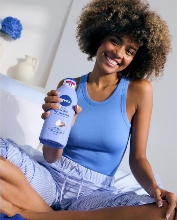 Produktbild NIVEA Soft Milk Verwoehnend Fl 400ml (Körpermilch, 400 ml)