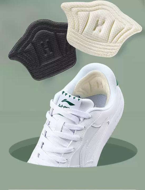 Immagine prodotto Stride Fersen Einlage Anti-Rutsch / Ultraweiche Stoff Pads / Massage Einlagen für Turnschuhe - 1 Paar Weiss