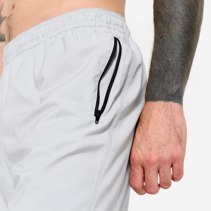Image du produit Domyos Short de fitness respirant poches zippés homme, gris perle (L)