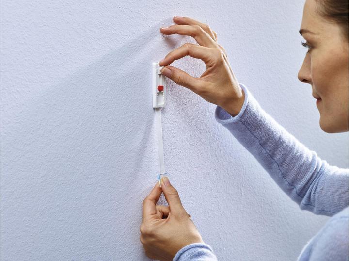 Actual product image tesa Adhesive nail wallpaper & plaster height adjustable