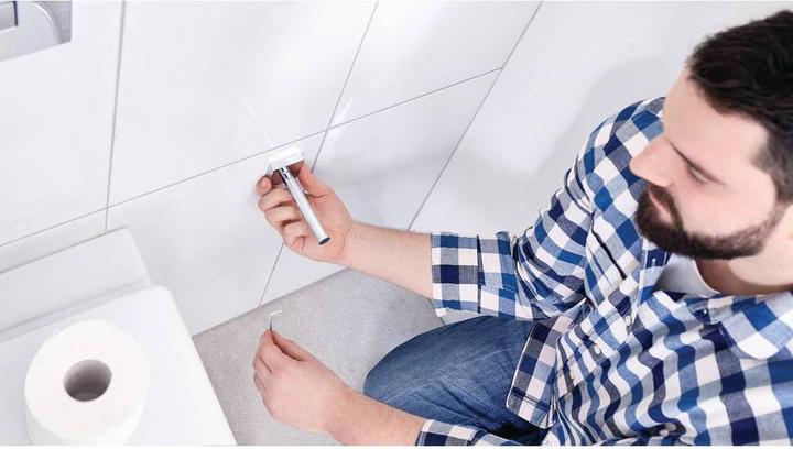 Actual product image tesa EKKRO WC replacement roll holder incl. adhesive solution without drilling