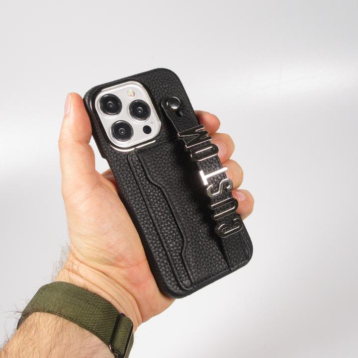 Image du produit PhoneLook Coque Personnalisée cuir sur mesure avec lettrage argent + lanière et compartiment carte (Apple iPhone 15 Pro)