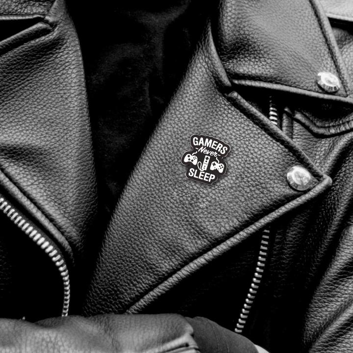 Actual product image JTI Brooch, metal - Gamers Never Sleep