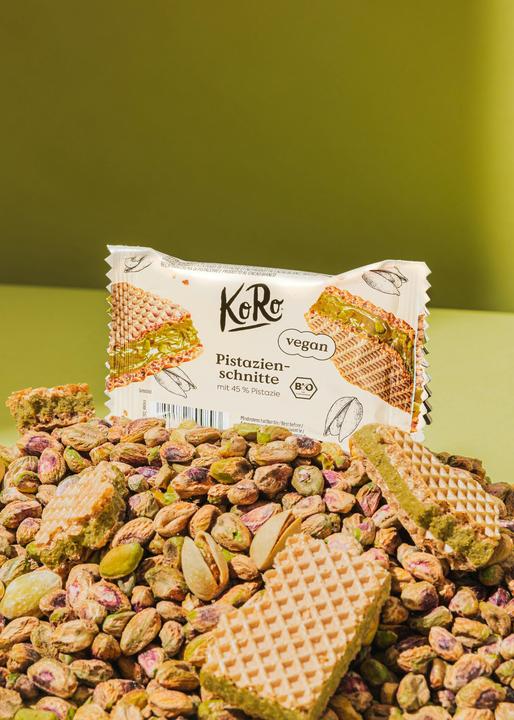 Produktbild KoRo Bio Gefüllte Waffelschnitte mit Pistazienmus und weissem Kakaoerzeugnis (12 Stk., 264 g)