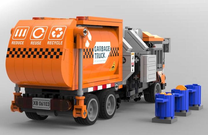 Immagine prodotto XingBao 18017 Camion dei rifiuti arancione