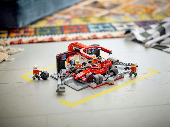 Immagine prodotto LEGO F1 Boxenstopp mit Boxencrew und Ferrari Flitzer (60443, LEGO City)