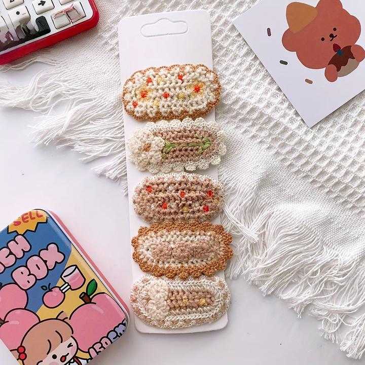Immagine prodotto Activity Board 5pcs Versatili fermagli per capelli con fiori lavorati a maglia, simpatici copricapo (5 pz.)