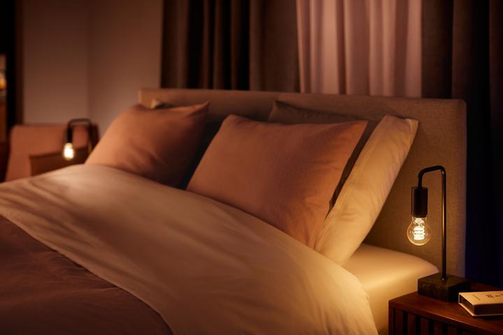 Produktbild Philips Hue E27 - Filament Lampe (E27, 7 W, 550 lm, 1 x, G)