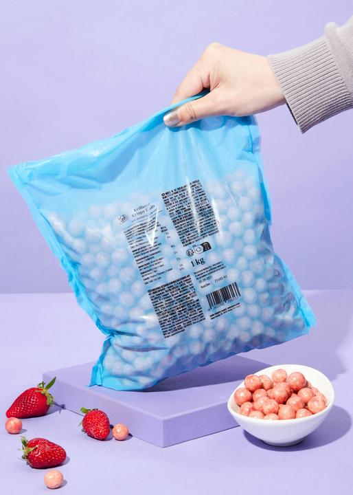 Produktbild KoRo Reis-Crispies in weisser Schokolade mit Erdbeerpulver (1000 g)