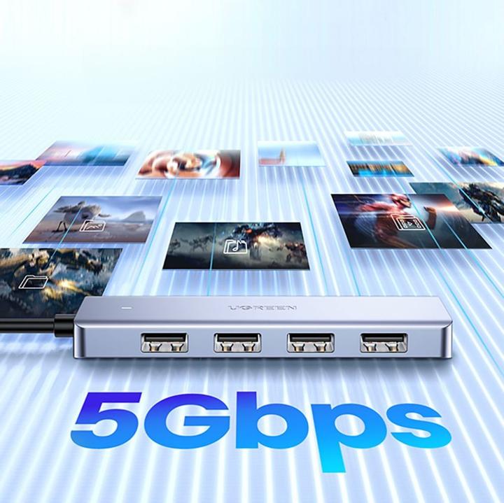 Produktbild Ugreen HUB CM219 35574 with 4 USB-A 3.0 ports and USB-A 3.0 cable 1m - black (USB-A, 4 Ports)