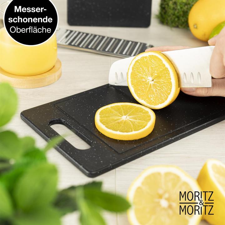 Immagine prodotto Moritz & Moritz 2X Taglieri in plastica con scanalatura per il succo in look granito - 25 x 15 cm