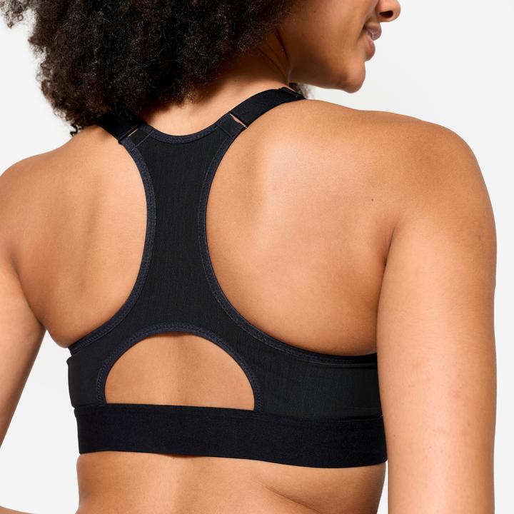 Immagine prodotto Domyos Sport-BH Damen mit Reissverschluss und Pads starker Halt - schwarz/weiss (XL)