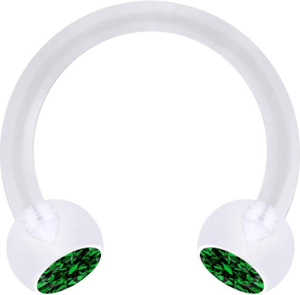 Actual product image Star Piercing Micro Circular Barbell transparent with two green crystal balls (Bioflex, without brass)