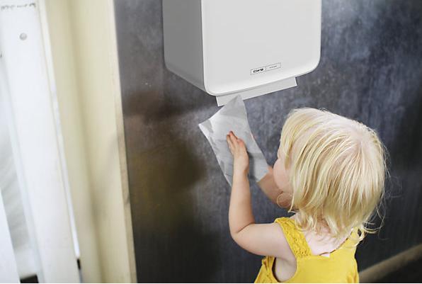 Actual product image CWS PureLine plastic towel dispenser with lock white for 300 sheets of ply fold or zig-zag paper