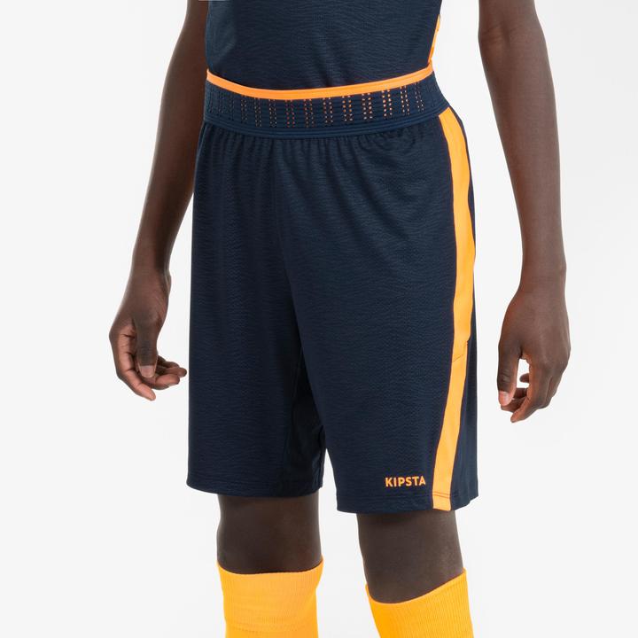 Immagine prodotto Kipsta Pantaloncini da calcio per bambini - CLR blu navy/arancio (6, 7, 8)